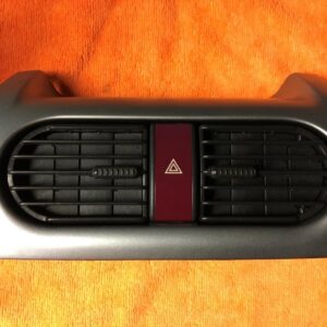 Grille d'aération tableau de bord + commutateur feu de détresse Opel Corsa 1.3 JTD MT 2005 - GM 13174176