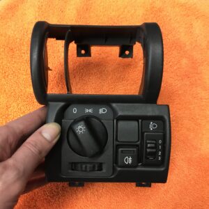 Central Console + headlight adjuster switch Opel Corsa B - GM AT315223